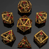 Gold w/Red Skulls Grin Hollow Metal Dice Set (7)
