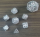 Hollow 10mm mini Dragons Eye Dice Set Shiny Silver w/Pink Gems (7)