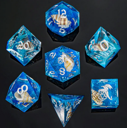 Captured Magic Handmade Sharp Edge Resin Dice Ocean Blue w/Sea Snail Inclusion (7)